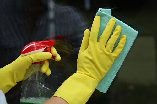 Professional commercial cleaning team maintaining a modern office space