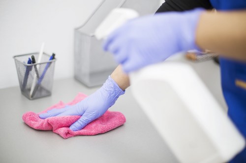 Professional upholstery cleaning on a fabric sofa