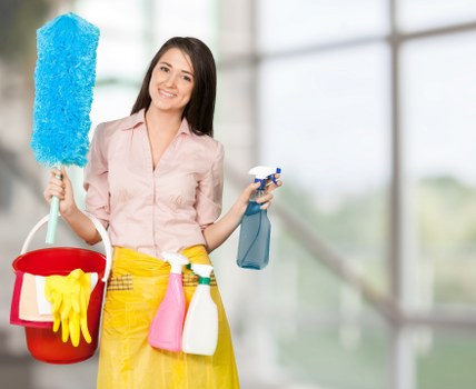 Professional cleaner maintaining shared corridor